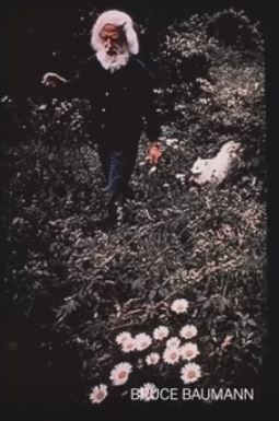Leo Kenton Coleman with dog and flowers 69